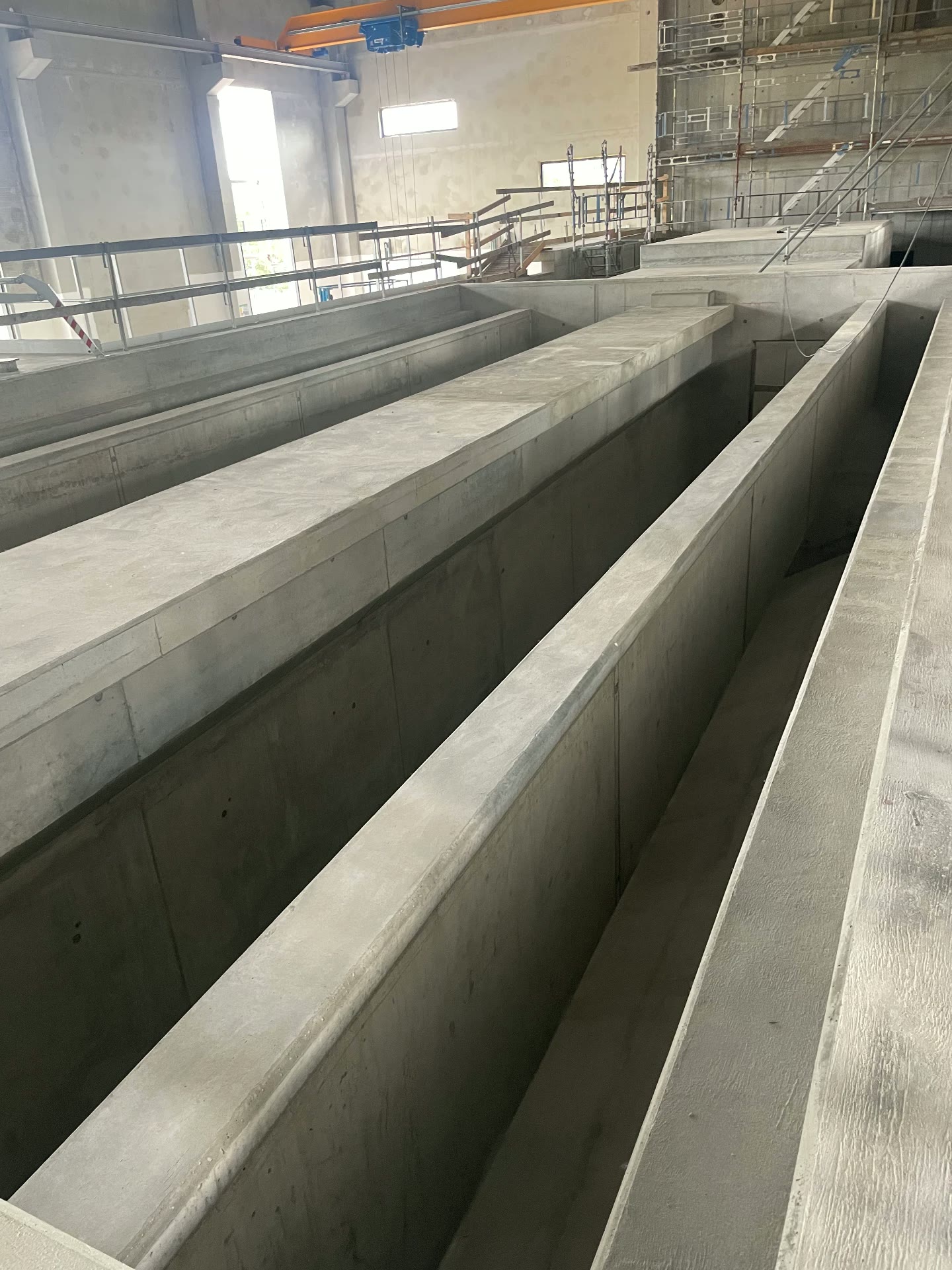 Long concrete basin channels of the new treatment hall in Kristianstad before lining